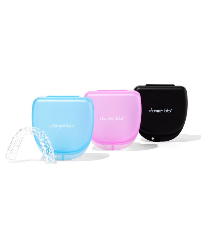 Chomper Labs night guard and mouth guard container cases in blue, pink and black colors.